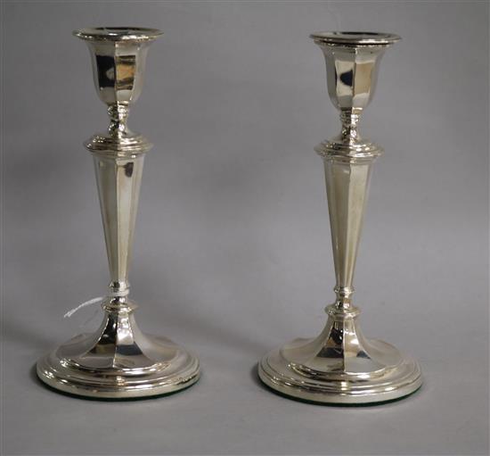 A pair of George VI silver candlesticks by Robert Pringle & Sons, Sheffield, 1937, 18cm.